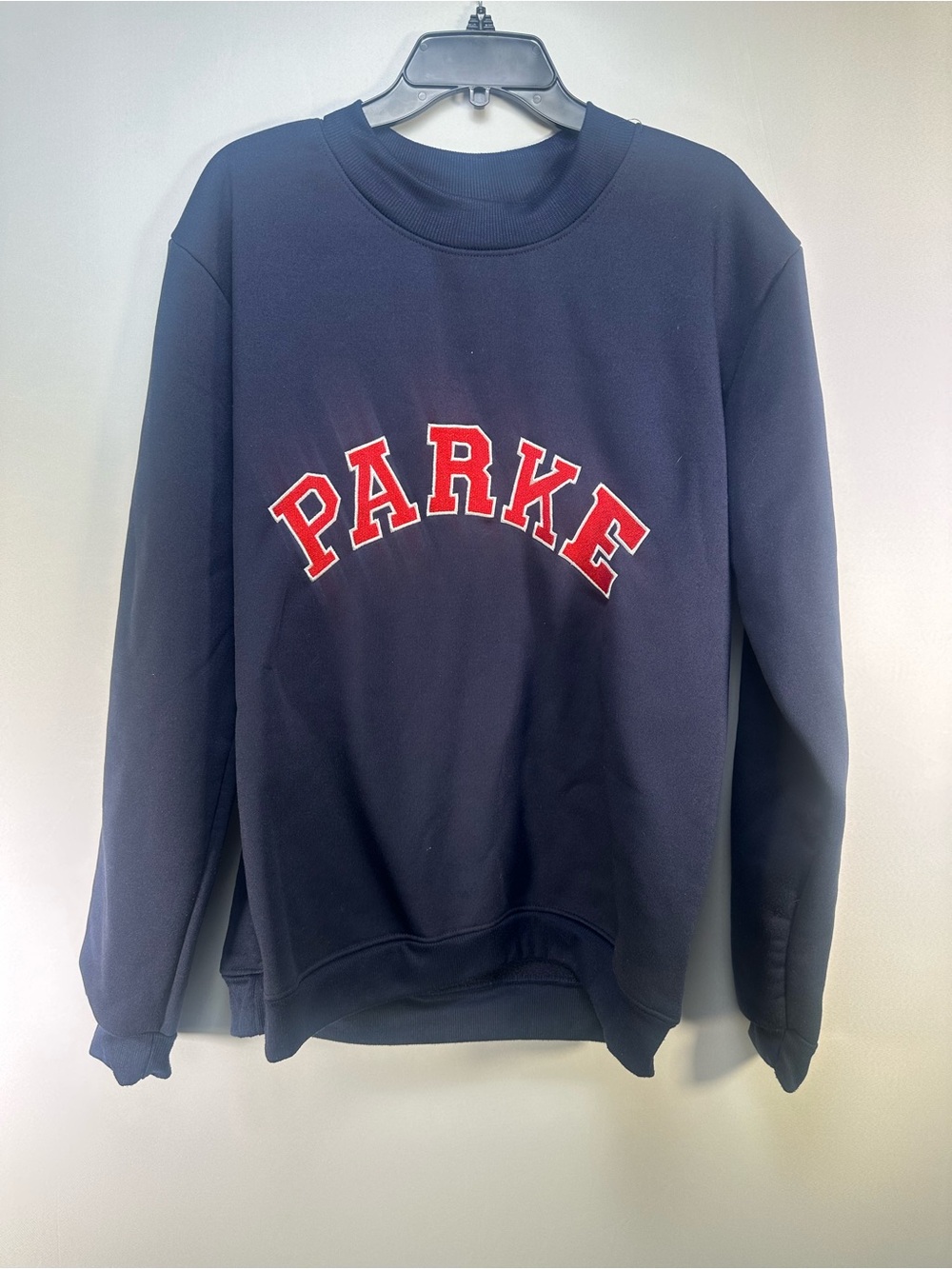 PARKe Navy Crew Sweatshirt with Red Arch Logo